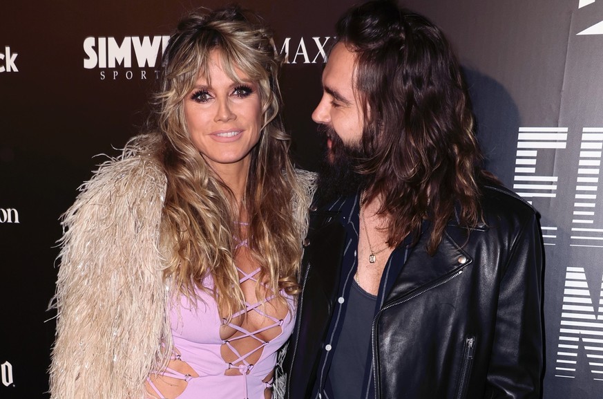 LOS ANGELES, CALIFORNIA - FEBRUARY 12: Heidi Klum and Tom Kaulitz attend Maxim Electric Nights presented by DIRECTV at City Market on February 12, 2022 in Los Angeles, California. (Photo by David Livi ...