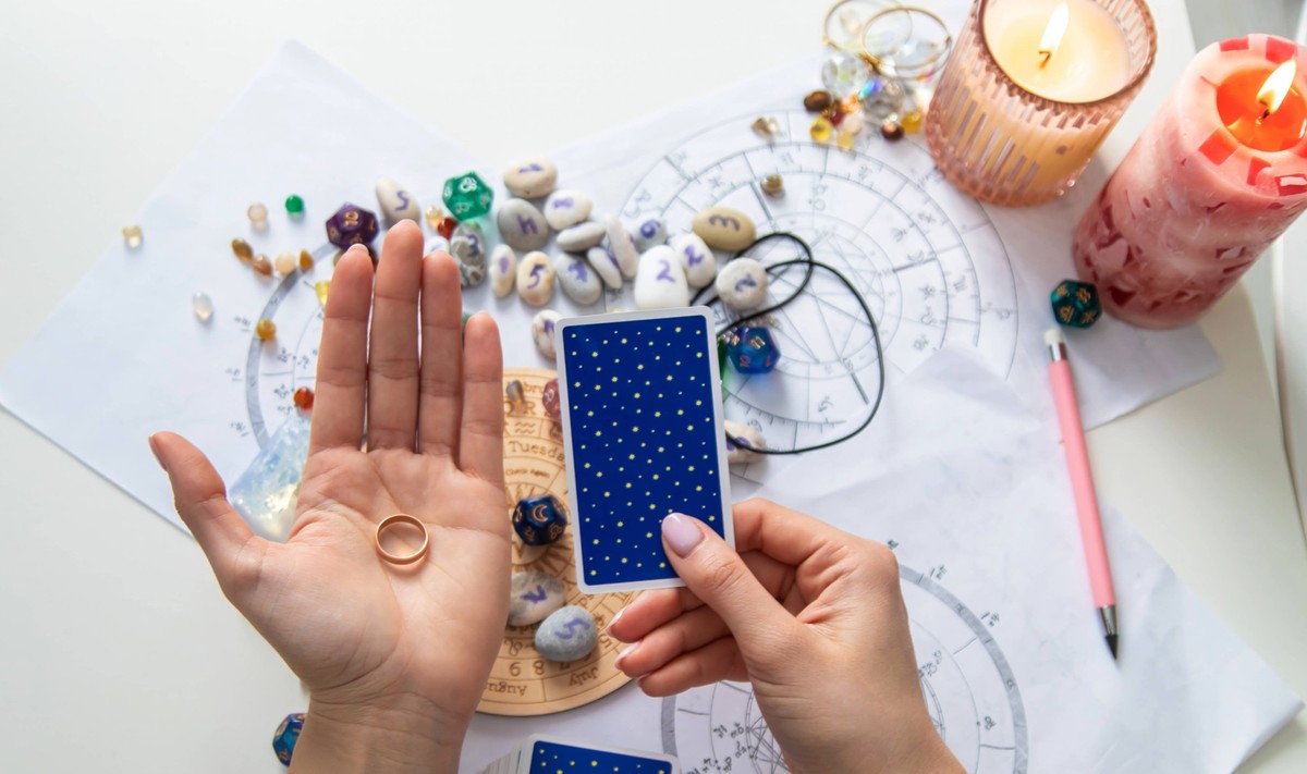 A fortune teller reads with tarot cards. Selective focus A fortune teller reads with tarot cards. Selective focus., 96721492.jpg RECORD DATE NOT STATED
