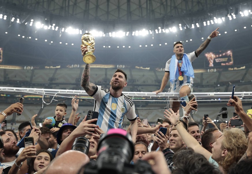 Lionel Messi of Argentina celebrates today, after winning the Qatar 2022 World Cup final between Argentina and France at the Lusail stadium, Qatar, 18 December 2022. Soccer World Cup 2022: Argentina - ...