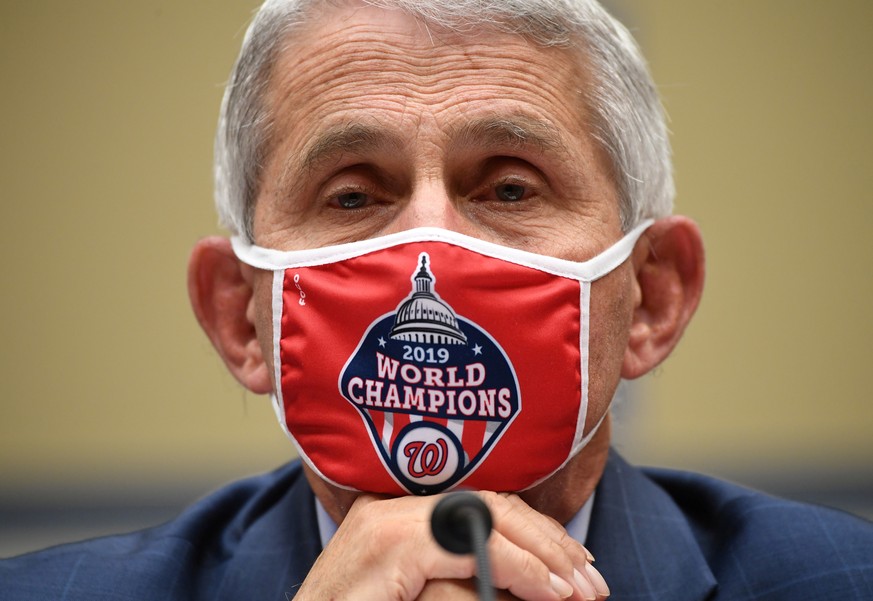 FILE PHOTO: Dr. Anthony Fauci, director of the National Institute for Allergy and Infectious Diseases, testifies during the House Select Subcommittee on the Coronavirus Crisis hearing in Washington, D ...