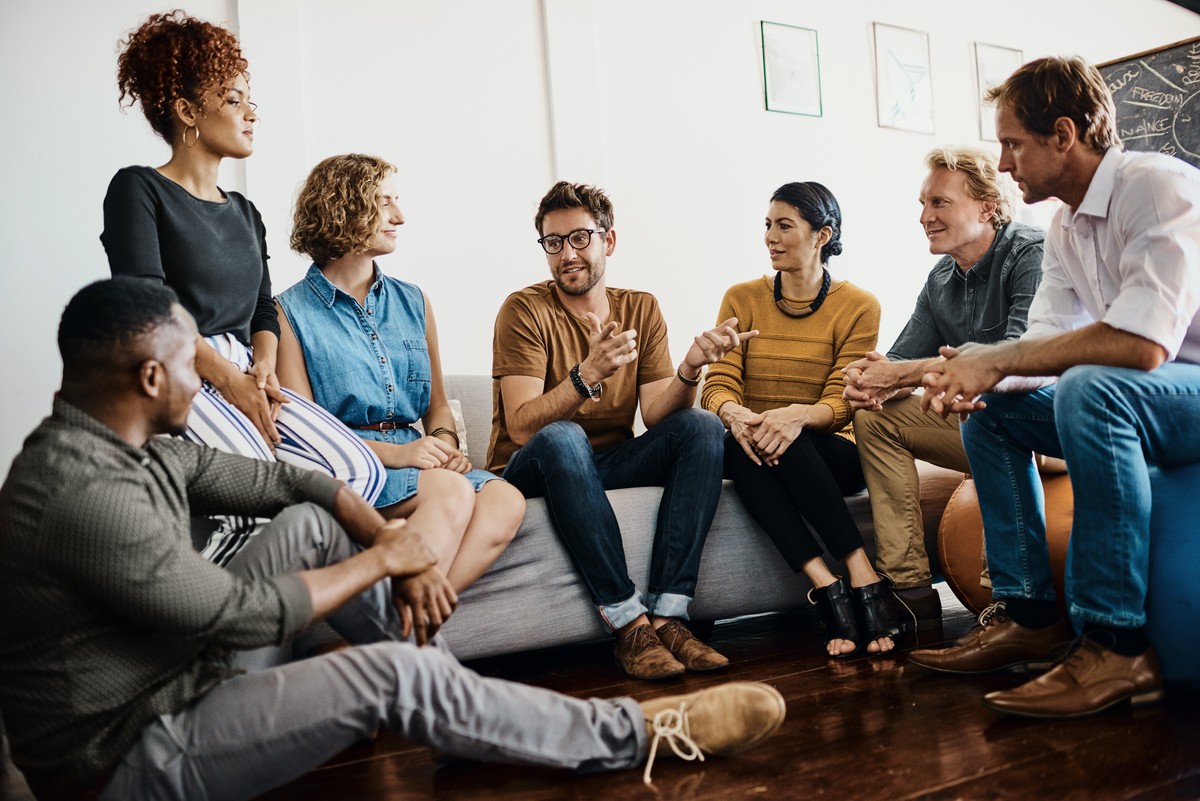 Shot of a group of designers having a discussion in an office