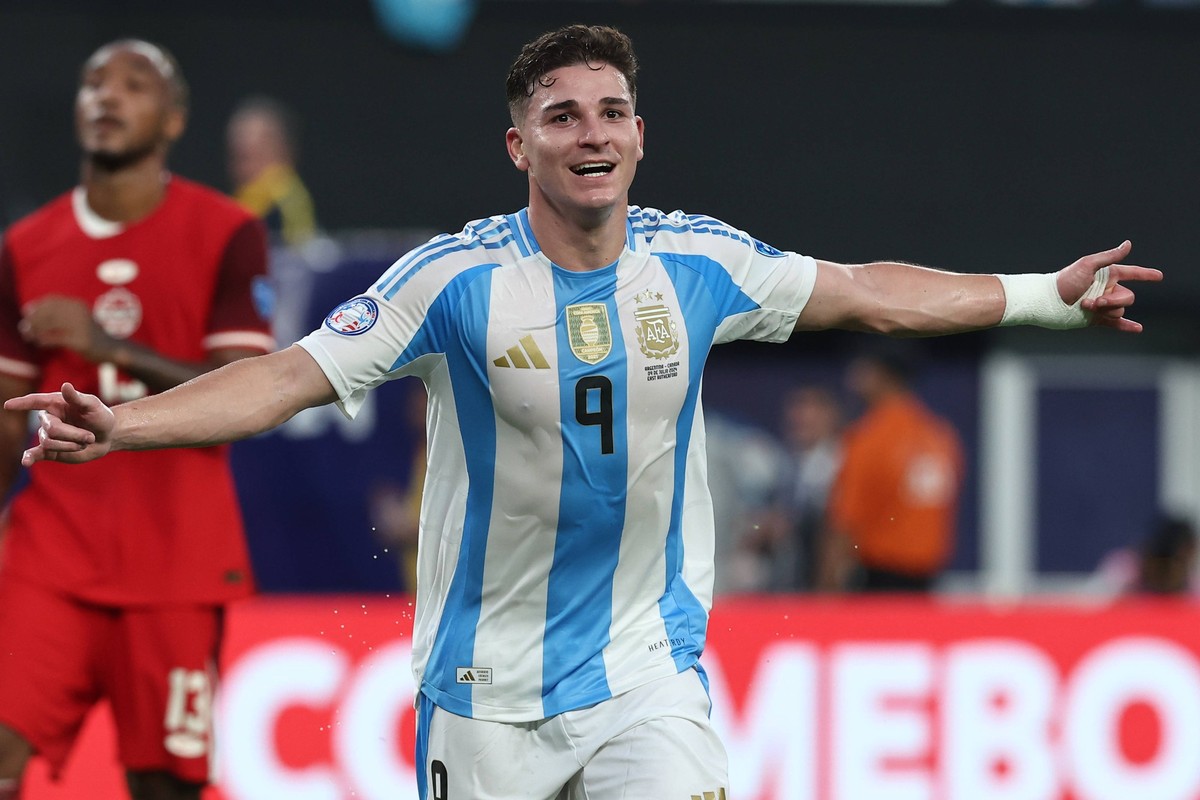 Argentina s forward Julian Alvarez C celebrates after scoring a goal against Canada during the Copa Am� rica USA 2024 semifinal match, at MetLife Stadium in New Jersey, on July 9, 2024. NEW JERSEY UNI ...