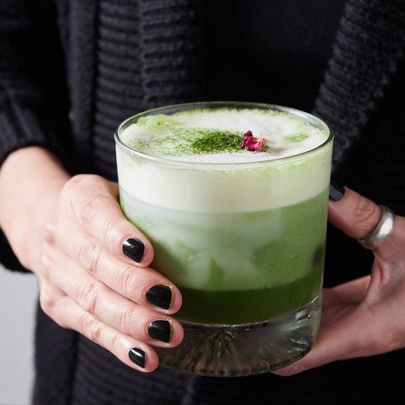 Unrecognizable woman with glasses of green matcha cocktails with milk AnaLopez_ID12714_385890_014 Copyright: xAnaxLopezx
