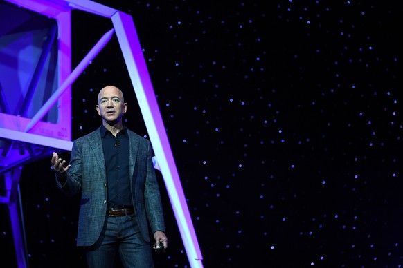 Founder, Chairman, CEO and President of Amazon Jeff Bezos unveils his space company Blue Origin&#039;s space exploration lunar lander rocket called Blue Moon during an unveiling event in Washington, U ...
