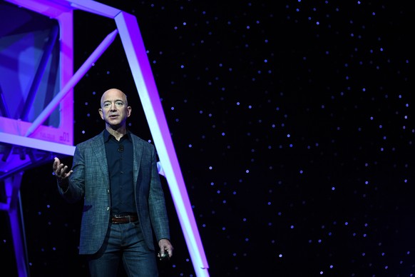 Founder, Chairman, CEO and President of Amazon Jeff Bezos unveils his space company Blue Origin's space exploration lunar lander rocket called Blue Moon during an unveiling event in Washington, U.S., ...