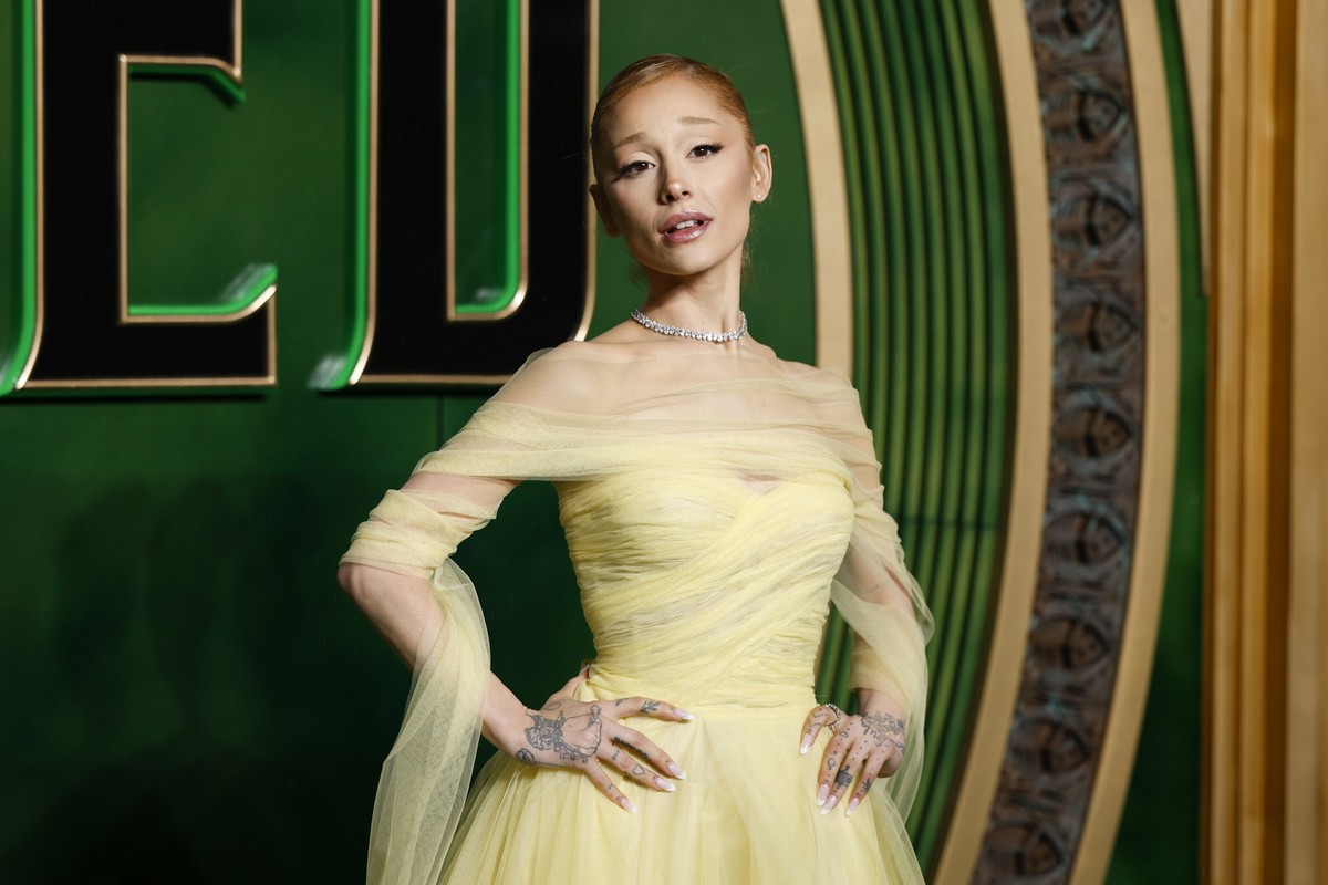 Ariana Grande poses for photographers upon arrival at the premiere of the film 'Wicked' on Monday, Nov. 18, 2024, in London. (Photo by Millie Turner/Invision/AP)
