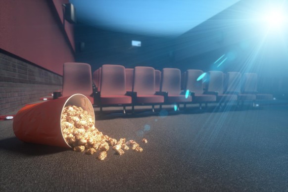 fallen bucket of popcorn in an abandoned movie theater, during the epidemic of the coronavirus 3d render
