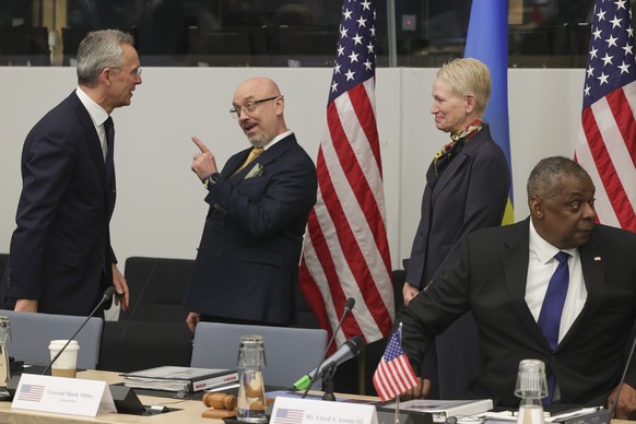 CAPTION CORRECTS THE ID - From left, NATO Secretary General Jens Stoltenberg, Ukraine&#039;s Defense Minister Oleksiy Reznikov, Celeste Wallander, United States Assistant Secretary of Defense for Inte ...