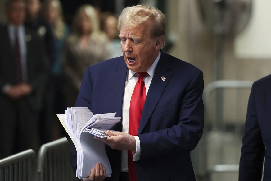 Former President Donald Trump speaks after leaving Manhattan criminal court, Tuesday, April 23, 2024, in New York. (AP Photo/Yuki Iwamura, Pool)