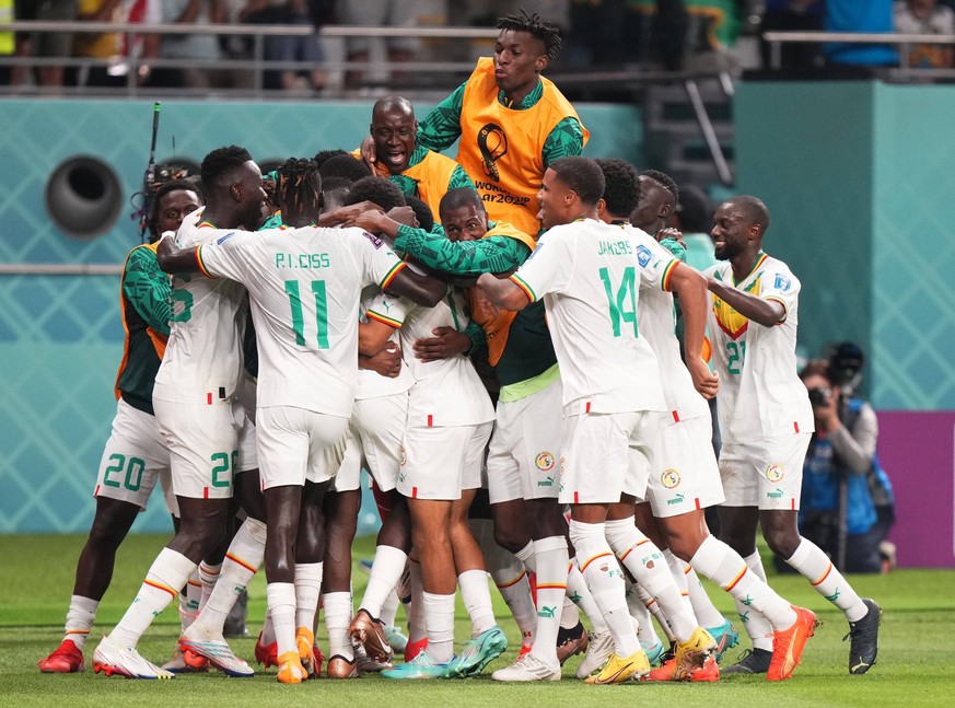 QAT: Ecuador and Senegal. FIFA World Cup, WM, Weltmeisterschaft, Fussball Qatar 2022 Sarr of Senegal celebrates his goal with his teammates during the FIFA World Cup Qatar 2022 match, Group A, between ...