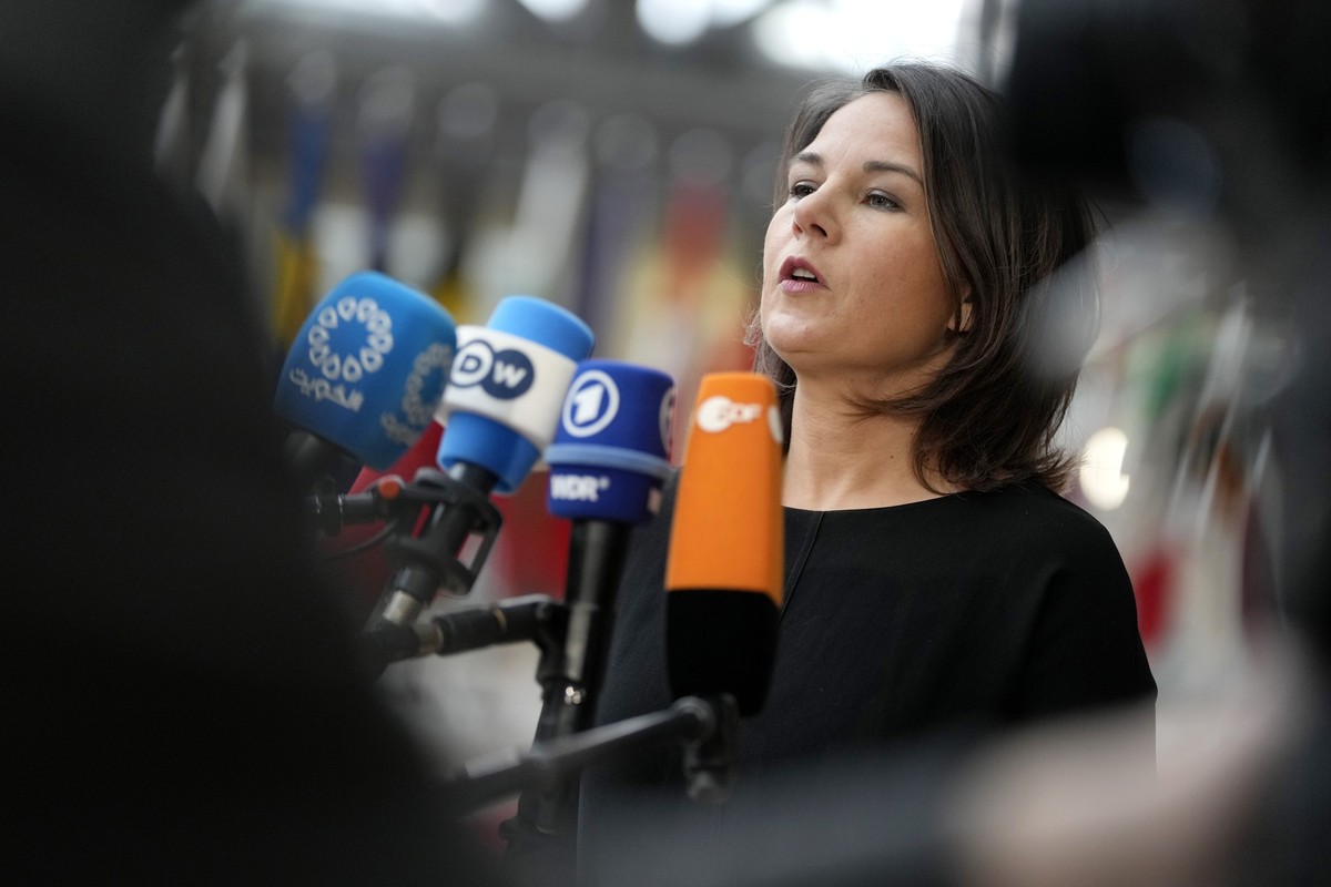 Germany's Foreign Minister Annalena Baerbock speaks with the media as she arrives for a meeting of EU foreign ministers at the European Council building in Brussels on Monday, March 20, 2023. Eur ...