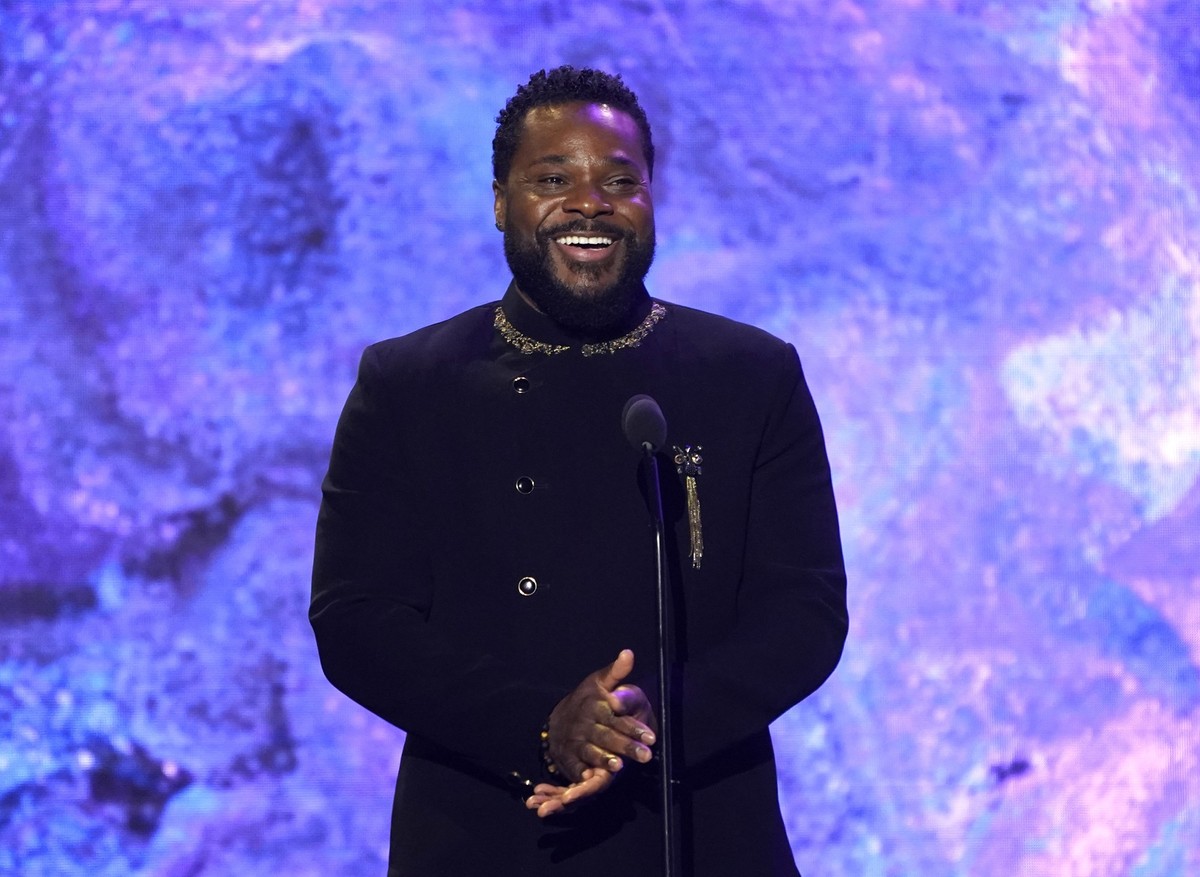 FILE - Malcolm-Jamal Warner speaks on stage at the 65th annual Grammy Awards on Sunday, Feb. 5, 2023, in Los Angeles. (AP Photo/Chris Pizzello, File)