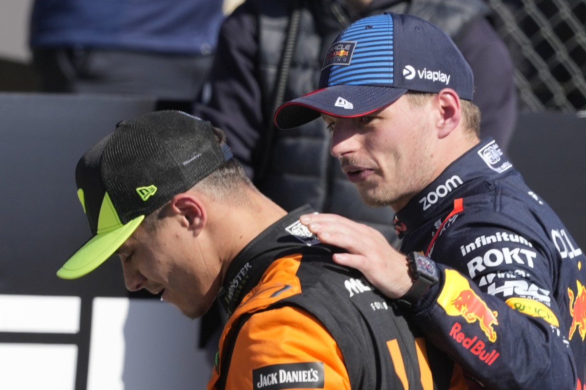 Red Bull driver Max Verstappen of the Netherlands, right, hugs McLaren driver Lando Norris of Britain after the British Formula One Grand Prix race at the Silverstone racetrack, Silverstone, England,  ...