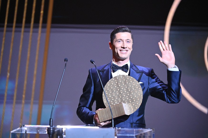 Handout photo of Robert Lewandowski receiving the Striker of the Year award at the ceremony for Ballon d&#039;Or 2021 held in Theatre du Chatelet, Paris, France, November 29, 2021. Photo by LEquipe vi ...