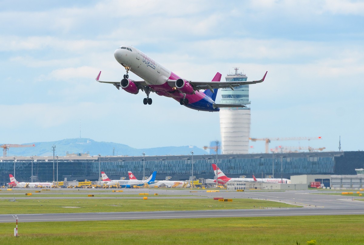 Aircraft at the airport of vienna, austria, Schwechat, austria, 20 may 2019, Airbus A321-231, ha-lth operated by wizz airline take off at vienna international airport