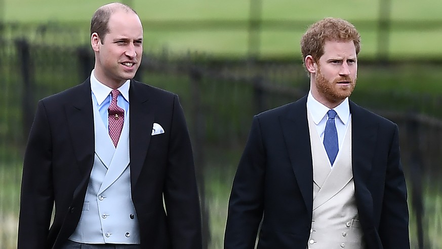 ENGLEFIELD GREEN, ENGLAND - MAY 20: Britain&#039;s Prince Harry (R) and Britain&#039;s Prince William, Duke of Cambridge attend the wedding of Pippa Middleton and James Matthews at St Mark&#039;s Chur ...