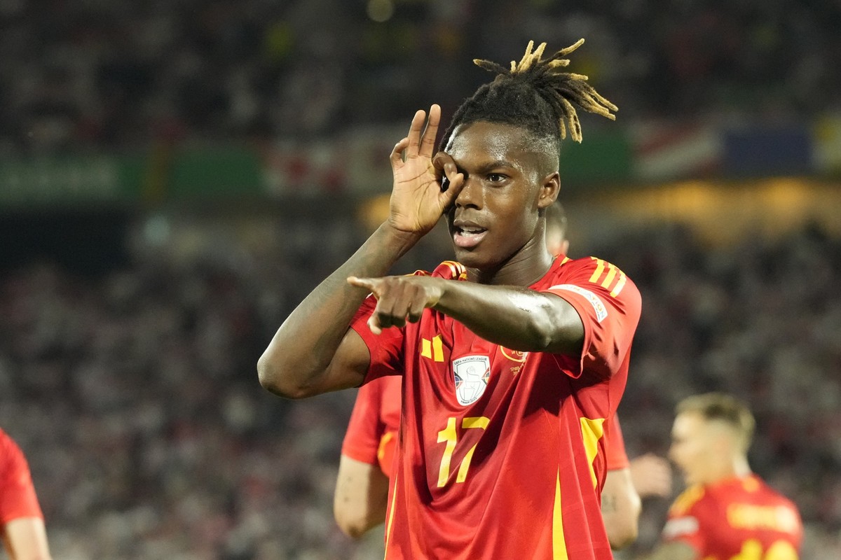 Spain&#039;s Nico Williams celebrates after scoring his side&#039;s 3rd goal against Georgia during a round of sixteen match at the Euro 2024 soccer tournament in Cologne, Germany, Sunday, June 30, 20 ...