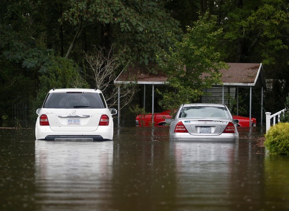 Cars sit flooded in the Mayfair community during Tropical Storm Florence in Lumberton, North Carolina, U.S., September 16, 2018. REUTERS/Randall Hill