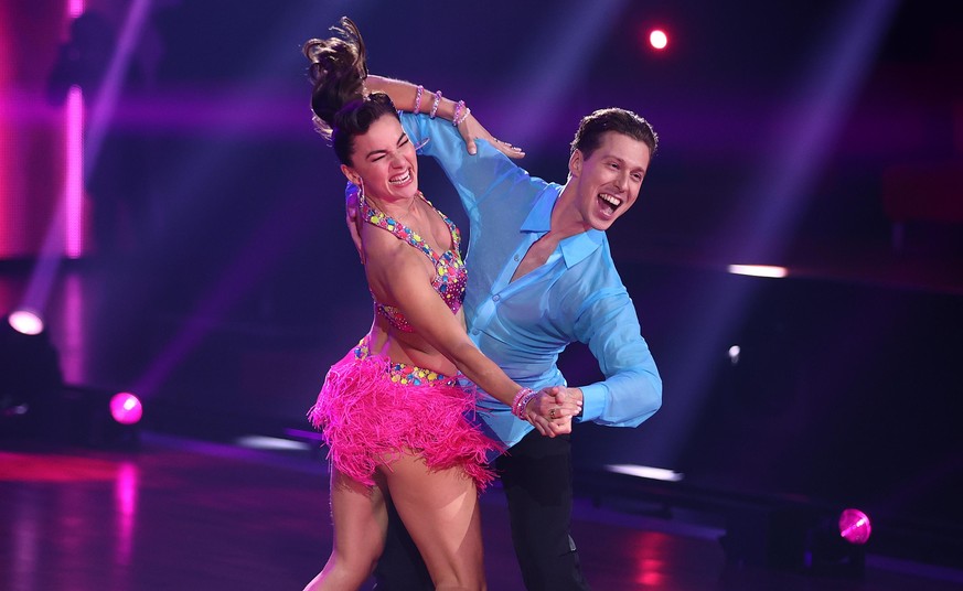 COLOGNE, GERMANY - MARCH 19: Renata Lusin and Valentin Lusin perform on stage during the 3rd show of the 14th season of the television competition &quot;Let&#039;s Dance&quot; on March 19, 2021 in Col ...