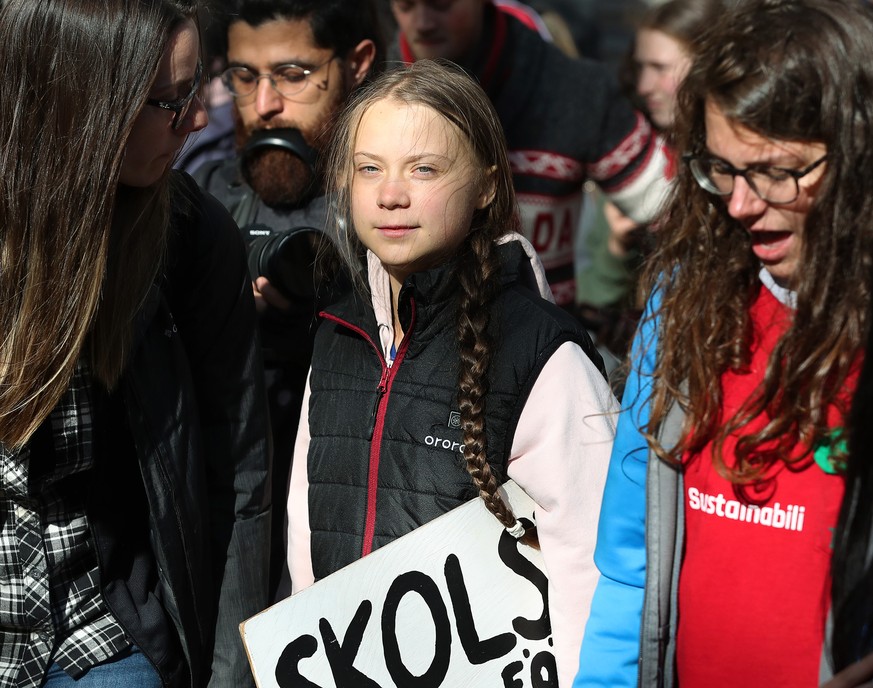 Swedish teen activist Greta Thunberg arrives for the post federal election Friday climate strike march starting and ending at the Vancouver Art Gallery in Vancouver, British Columbia on Friday, Octobe ...