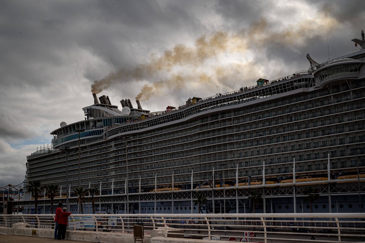 June 23, 2024, Barcelona, Spain: A cruise ship smokestacks give off smoke shortly before leaving the port of Barcelona. Sulphur oxide and nitrogen oxide emissions makes Barcelona port worst in Europe ...