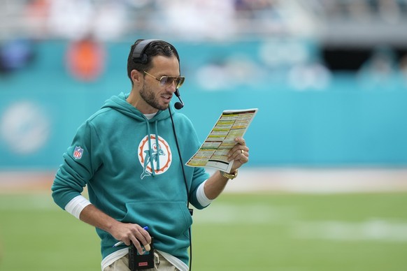Miami Dolphins head coach Mike McDaniel directs his players from the sideline during the first half of an NFL football game against the New England Patriots, Sunday, Oct. 29, 2023, in Miami Gardens, F ...