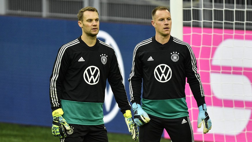 Germany&#039;s goalkeepers Marc-Andre ter Stegen, right, and Manuel Neuer exercise during a training session of the national team on Tuesday, Oct. 8, 2019, prior a friendly soccer match between German ...