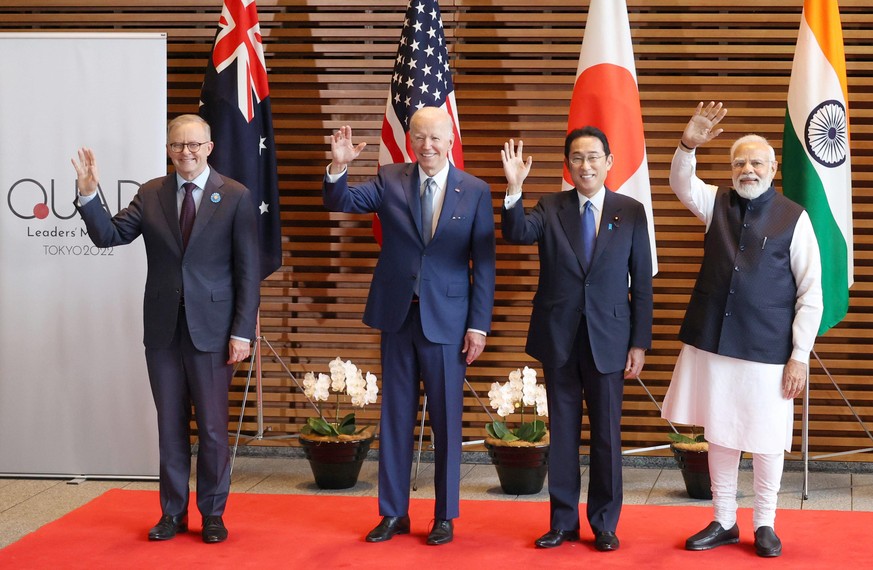 From left to right, Australian Prime Minister Anthony Albanese, U.S. President Joe Biden, Japanese Prime Minister Fumio Kishida and Indian Prime Minister Narendra Modi pose for photos before a Quad su ...