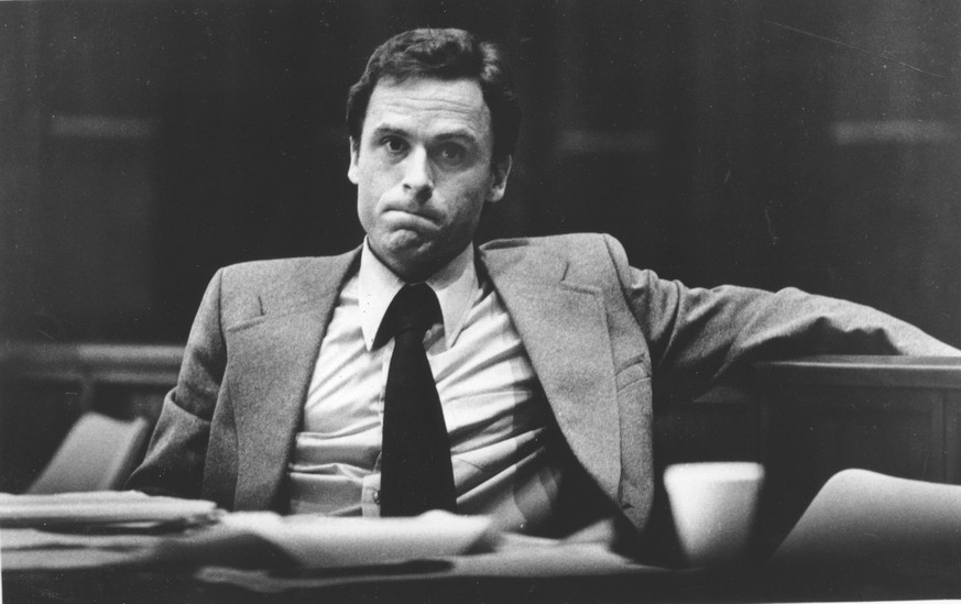 Accused murderer Theodore Bundy stares out at the photographer during the second day of jury selection in his murder trial in Miami, Fla., on June 27, 1979. Bundy is accused in the bludgeoning deaths  ...
