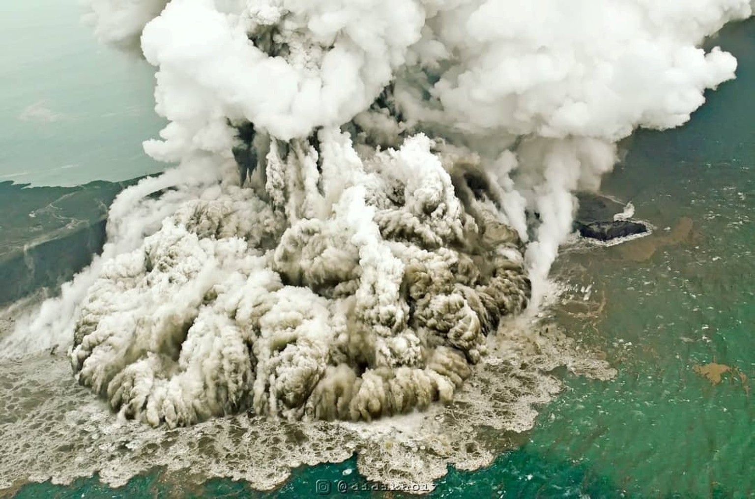 A plume of ash rises as Anak Krakatau erupts in Indonesia, December 23, 2018, in this picture obtained from social media. Susi Air/via REUTERS THIS IMAGE HAS BEEN SUPPLIED BY A THIRD PARTY. MANDATORY  ...