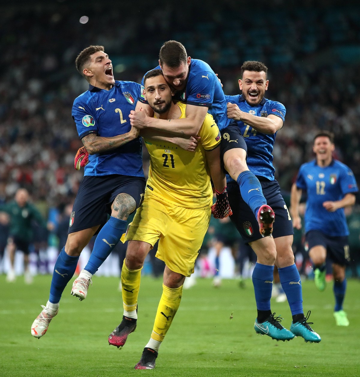 Gianluigi Donnarumma File Photo File photo dated 11-07-2021 of Italy players celebrating with goalkeeper Gianluigi Donnarumma after he saved the last penalty in the shoot-out following the UEFA EURO, ...