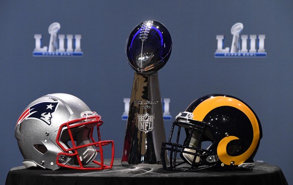 Jan 30, 2019; Atlanta, GA, USA; The Vince Lombardi Trophy and helmets for the New England Patriots and Los Angeles Rams are displayed before the Roger Goodell press conference in advance of Super Bowl ...