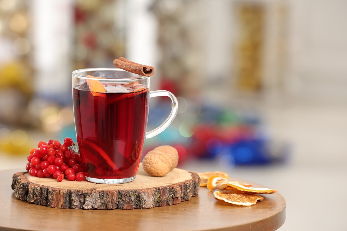 Aromatic mulled wine in glass cup on wooden table against blurred background. Space for text Model Released Property Released xkwx alcohol alcoholic aromatic background berries beverage blurred bokeh  ...
