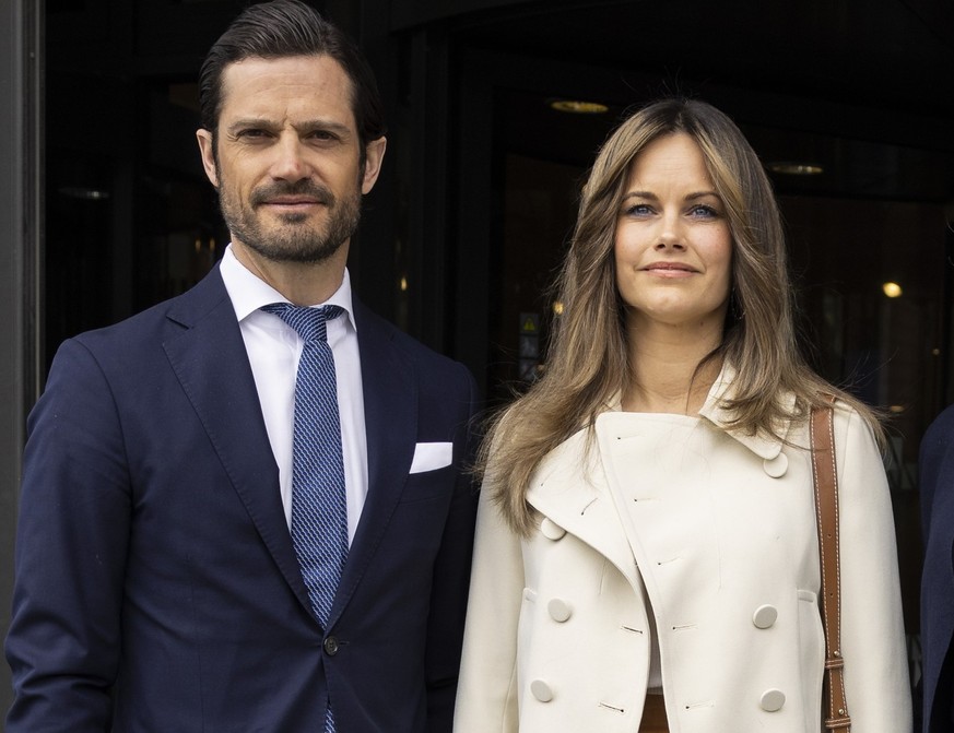 STOCKHOLM, SWEDEN - APRIL 25: Princess Sofia and Prince Carl Philip of Sweden arrive at the Karolinska Institute to attend a seminar on &quot;Research In Neuropsychiatric Disabilities&quot; on April 2 ...