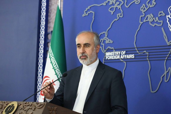 FILE - In this photo released on Thursday, Aug. 11, 2022, by the Iranian Foreign Ministry, Foreign Ministry spokesperson Nasser Kanaani speaks in Tehran, Iran. The Pentagon says U.S. military airstrik ...