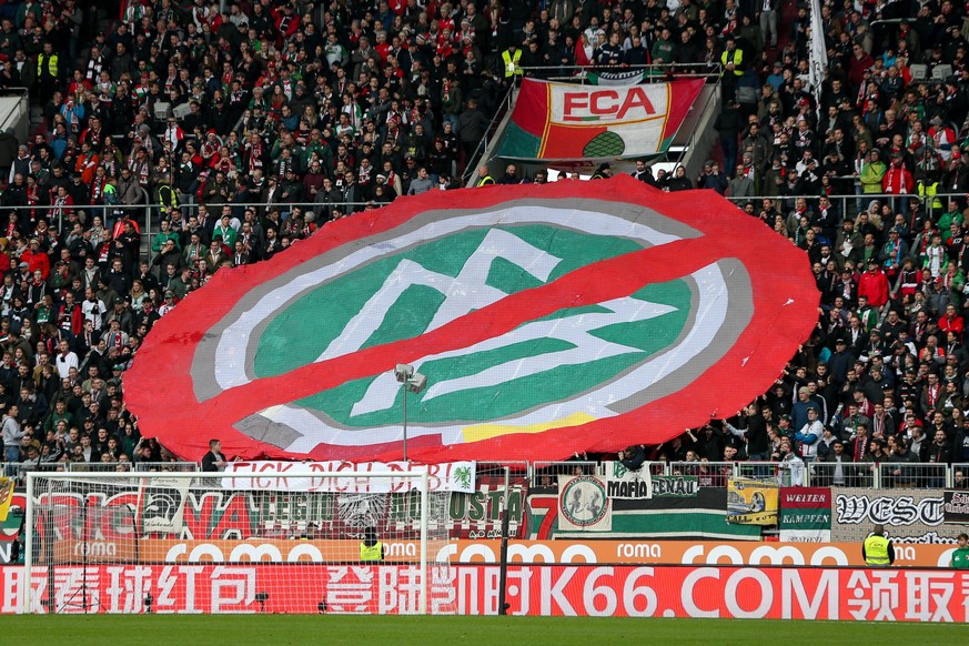 Fans FC Augsburg mit Chore gegen den DFB, FC Augsburg vs. Borussia Moenchengladbach, Fussball, 1.Bundesliga, 29.02.2020, DFL REGULATIONS PROHIBIT ANY USE OF PHOTOGRAPHS AS IMAGE SEQUENCES AND/OR QUASI ...