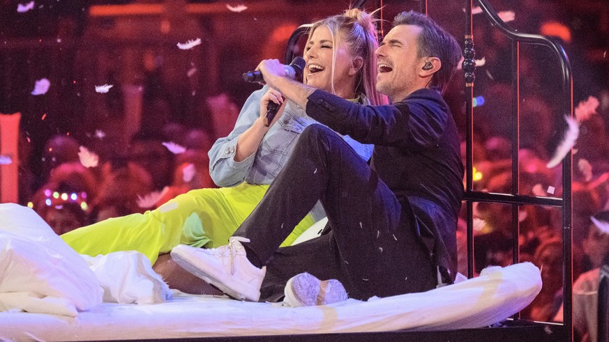 13.01.2024, Berlin: Der Moderator Florian Silbereisen und die Sängerin Beatrice Egli singen bei der Live-Fernsehshow «Schlagerchampions 2024» im Velodrom. Foto: Monika Skolimowska/dpa +++ dpa-Bildfunk ...