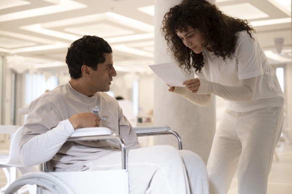 (L-R): Oscar Isaac as Marc Spector/Steven Grant and May Calamawy as Layla El-Faouly in Marvel Studios' MOON KNIGHT. Photo by Gabor Kotschy. ©Marvel Studios 2022. All Rights Reserved.