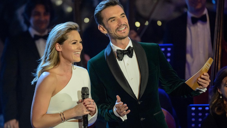 SUHL, GERMANY - NOVEMBER 26: Helene Fischer and Florian Silbereisen are seen on stage during the tv show &#039;Das Adventsfest der 100.000 Lichter&#039; on November 26, 2016 in Suhl, Germany. (Photo b ...