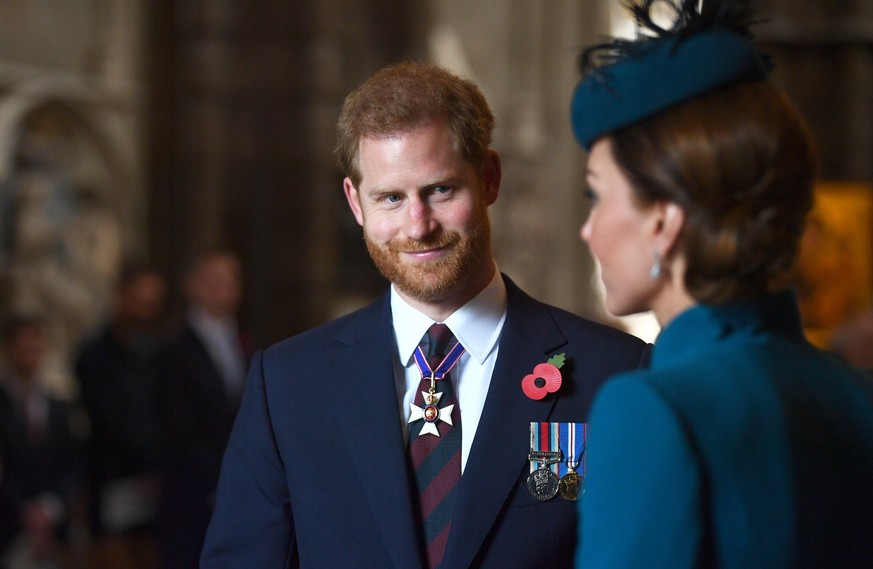 LONDON, ENGLAND - APRIL 25: Catherine, Duchess of Cambridge and Prince Harry, Duke of Sussex attend the ANZAC Day Service of Commemoration and Thanksgiving at Westminster Abbey on April 25, 2019 in Lo ...