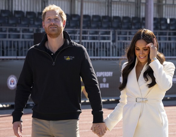 FILE - Prince Harry and Meghan Markle, Duke and Duchess of Sussex at the Invictus Games in The Hague, Netherlands, Sunday, April 17, 2022. A spokesperson for Prince Harry and his wife Meghan says the  ...