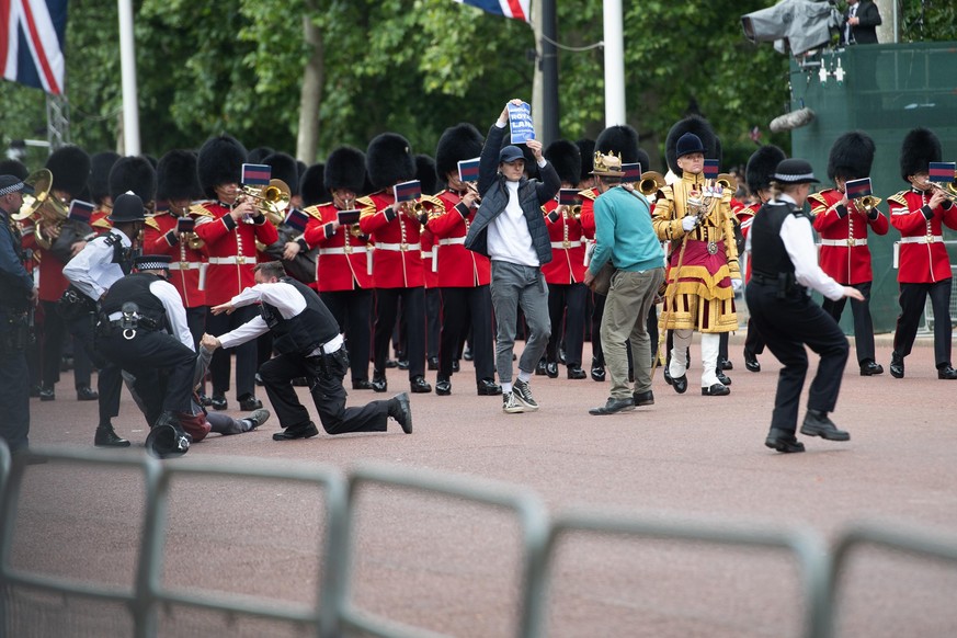 Extinction Rebellion protestors try to disrupt Queen Elizabeth II&#039;s Platinum Jubilee Ceremony by sitting in front of the Trooping The Colour procession before they are arrested - The Mall, London ...