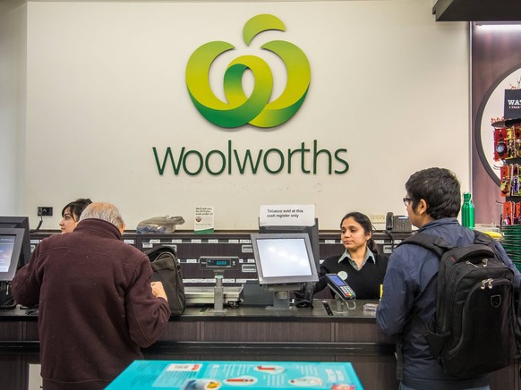 Australia: Woolworth s cuts 500 jobs Registers inside Woolworths flagship store pictured as Woolworths revealed 500 jobs will go in back office and supply roles as part of an overhaul of its business  ...