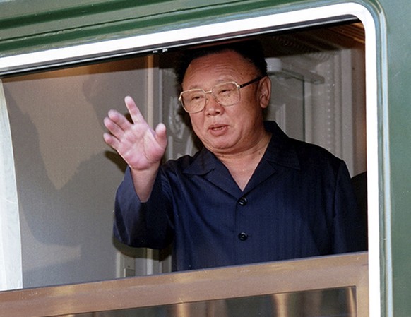 FILE - In this Aug. 20, 2002, file photo, then North Korean leader Kim Jong Il waves out of a window of his armored train at the Russian border railway station of Khasan, Russia. (AP Photo/Igor Kochet ...