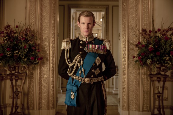 This image released by Netflix shows Matt Smith as Prince Philip from &quot;The Crown.&quot; Britain's Prince Philip stood loyally behind behind Queen Elizabeth, as his character does on Netflix's “Th ...