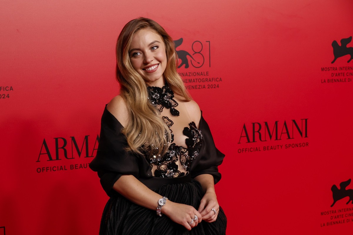 Sydney Sweeney poses for photographers upon arrival at the Armani Beauty event during the 81st edition of the Venice Film Festival in Venice, Italy, on Saturday, Aug. 31, 2024. (Photo by Joel C Ryan/I ...
