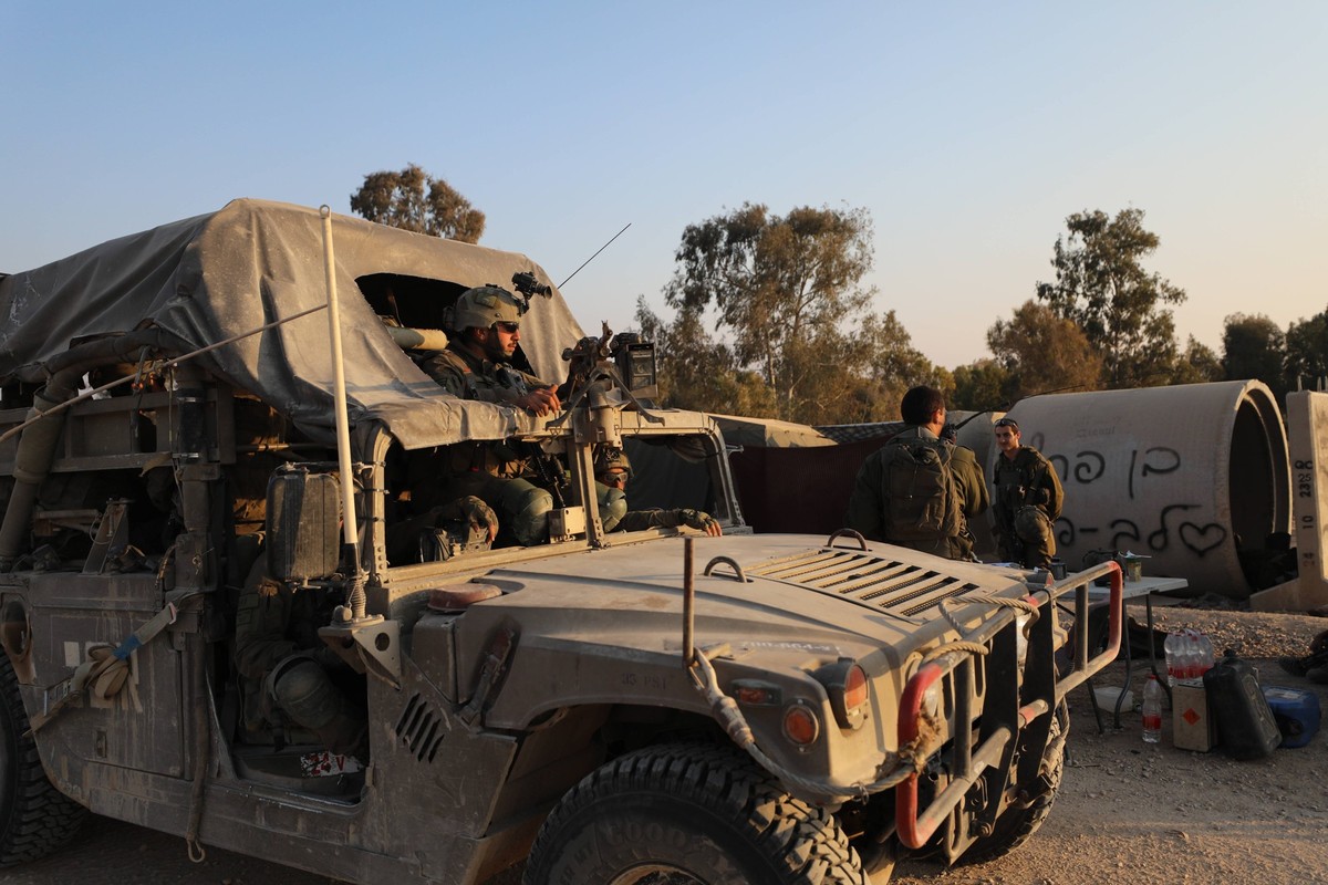 240408 -- SDEROT, April 8, 2024 -- Israeli troops are seen near the border with Gaza Strip, in southern Israel, on April 7, 2024. Israeli troops were withdrawn from southern Gaza in preparation for a  ...