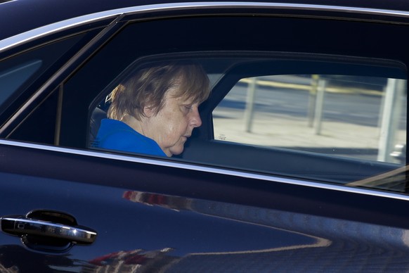 German Chancellor Angela Merkel arrives in a car for a board meeting of her Christian Democratic Union party at the headquarters in Berlin, Monday, July 2, 2018. (AP Photo/Markus Schreiber)