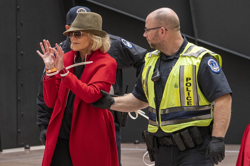 Actor Jane Fonda is arrested by US Capitol Police during the Fire Drill Friday Climate Change Protest in Washington, DC on Friday Nov. 1, 2019. Protesters are demanding immediate action for the Green  ...