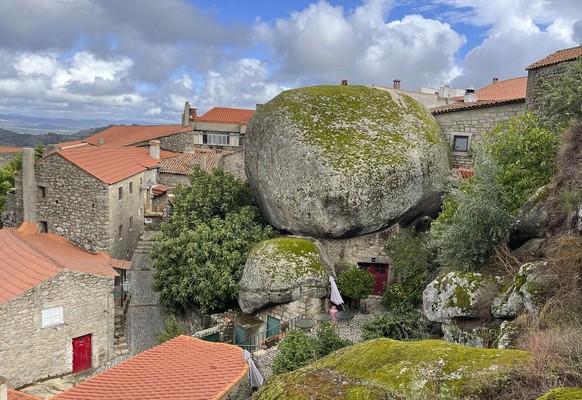 A home in the village of Monsanto, Portugal is situated around massive boulders in Monsanto, Portugal on Sept. 18, 2023. (Kristen de Groot via AP)